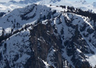 Looking across at Angora Peak in the foreground, Echo Peak in the Middle, and Moon Couloir off Round Top in the background